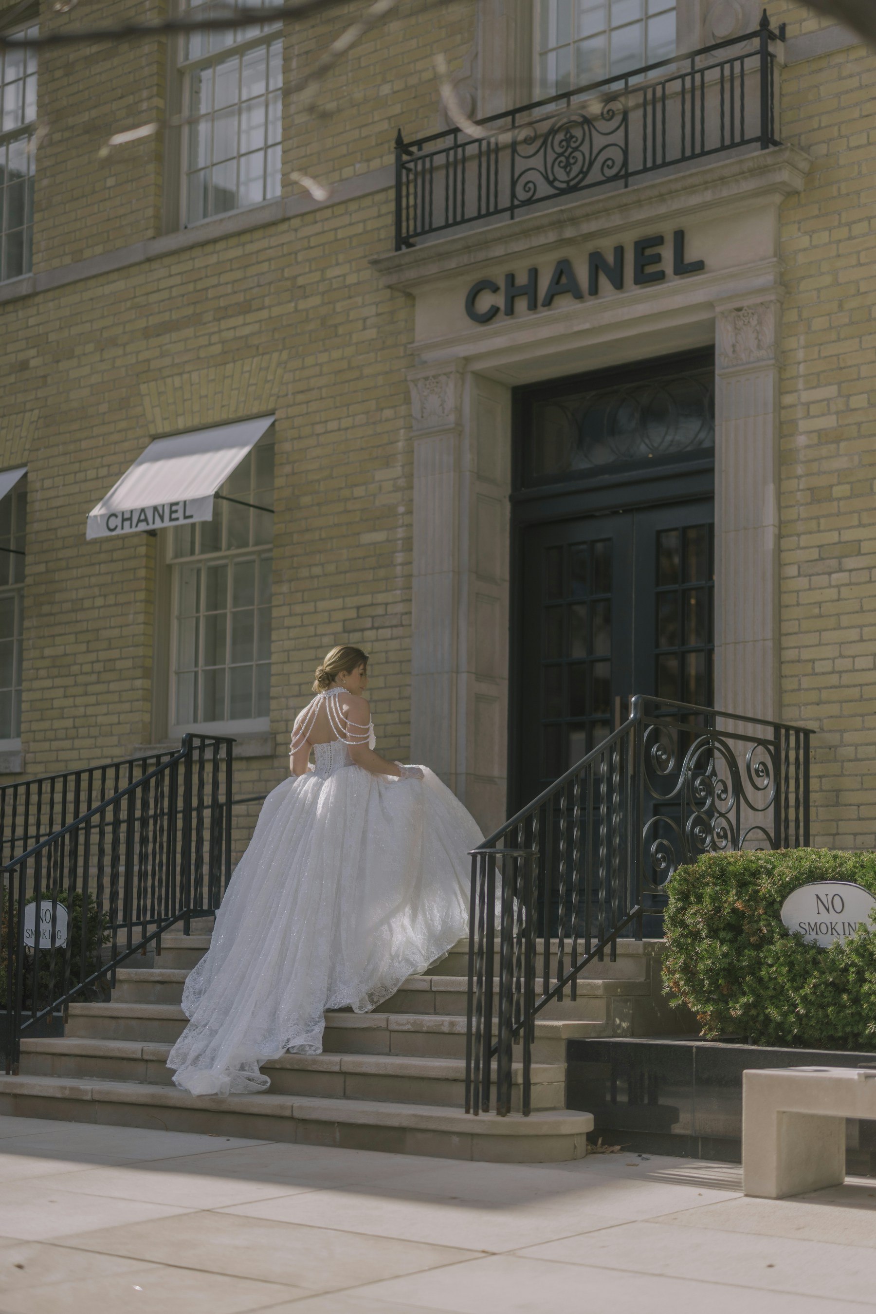 Editorial bride walking in a couture wedding gown